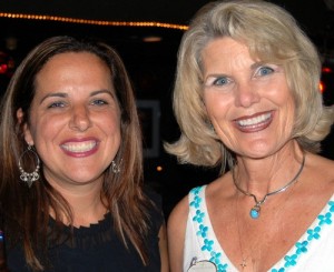 Melanie Morrison, executive director of the SouthShore Chamber of Commerce, left, greets Connie Lesko of Freedom Plaza.