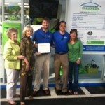 Sandy recognizes Convenient Cleaners at a recent ribbon-cutting ceremony. Owners Chris Whitney and Ryan Reynolds grew up in Tampa and are pictured here with Sandy and their moms