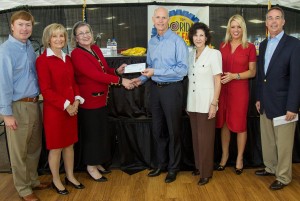 Commissioner Sandy Murman is on hand with The Children's Home Board Chair, Carolyn Harbert for a presentation from Governor Rick Scott and CFO Jeff Atwater at the State Fair. From left are: Agriculture Commissioner Adam Putnam, Sandy, Ms. Harbert, Gov. Scott, Mary Lu Kiley, CFO for The Children's Home, Attorney General Pam Bondi and CFO Atwater.