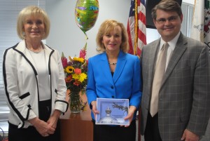 Commissioner Sandy Murman and Hillsborough County Attorney Chip Fletcher recognize Chief Assistant County Attorney Jennie Tarr for her service to Hillsborough County.