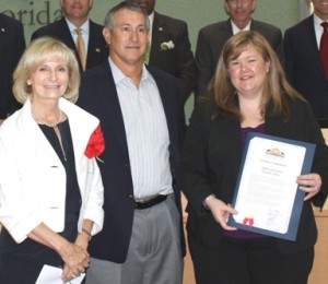 Sandy honors the Judeo Christian Health Clinic for its 40 years of service; Executive Director Kelly Bell and Board Secretary Frank John Garcia accepted at the BOCC
