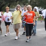 Sandy walks with members of the community and Public Defender Julianne Holt at the Mendez Foundation Too Good For Drugs Walk & Kids Fest held at MOSI