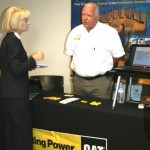Sandy talks with Noel Schoonmaker of RingPower during her South County Job Fair at the SouthShore Regional Service Center in Ruskin