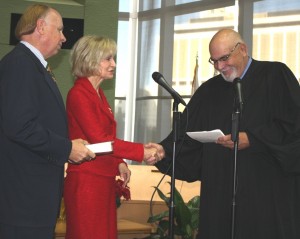 Sandy is sworn in for her second term as the District 1 Hillsborough County Commissioner by Chief Judge Manuel Menendez, Jr. with Jim Murman by her side