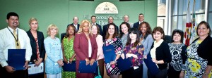 Commissioner Murman proclaims Back to School Readiness Month. School Board Member Susan Valdez, Martine Dorvil of the UACDC and Cindy Morris of the Department of Health and many partners were on hand to accept the proclamation.