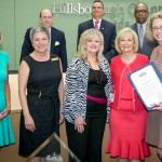 Sandy recognized the Committee on the Status of Women for its choices for the Hillsborough County Women's Hall of Fame. From left are Connie Gage, Linda D'Aquila, Dotti Groover-Skipper, and Yvonne Fry.