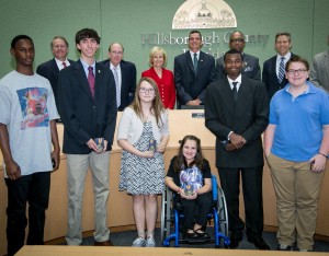 Sandy and the Commissioners honored Leigh Dittman, Julia Woolley, Sam Estes, Demonde Ragins, Ervin Harris, and Derek Frantz with YEA! Youth Excellence and Achievement Awards at a BOCC meeting.