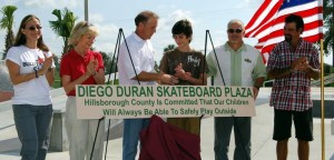 Sandy helps dedicate the Diego Duran Skateboard Plaza at Apollo Beach with Diego's family and other county staff