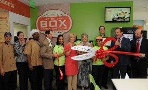 Commissioner Sandy Murman takes time to cut the ribbon for Metropolitan Ministries’ second Inside the Box restaurant location on Westshore Blvd.