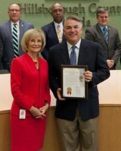Sandy recognizes Port Tampa Bay on its 70th Anniversary. On hand to receive the honors is Port Director Paul Anderson.
