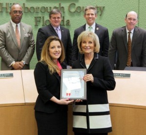 Commissioner Sandy Murman honored Danielle Charette at the BOCC's quarterly awards ceremony for helping open the doors to prosperity and ensure financial security for countless people in the Hispanic community, especially women.