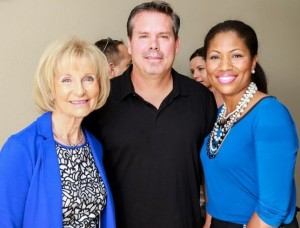 Commissioner Murman takes a moment to visit with Tom Phanco, Chief Operating Officer with CTV Capital, and Estella Gray of the Southwest Florida Water Management District at a ribbon cutting ceremony.