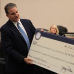 On behalf of Hillsborough County, Commissioner Sandy Murman and County Administrator Mike Merrill accept a check for $113,185.79 from State of Florida Chief Financial Officer Jimmy Patronis. The funds are from the State’s Unclaimed Property Fund and are sourced from a variety of accounts in the county’s name.