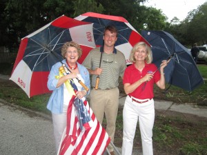 Commissioner Murman stands with Julie Whitney and Chris Whitney during 9-11 Memorial