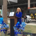 Commissioner Sandy Murman announces the Children's Museum Pinwheels for Prevention Program.
