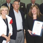 Sandy honors the Judeo Christian Health Clinic for its 40 years of service; Executive Director Kelly Bell and Board Secretary Frank John Garcia accepted at the BOCC