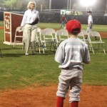 Commissioner Sandy Murman throws out the Ceremonial First Pitch during the Opening Day festivities for East Bay Little League.