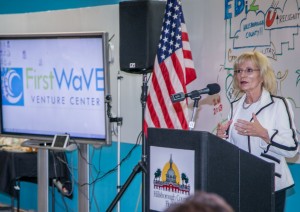 Commissioner Sandy Murman welcomes guests to the EDI2 (Economic Development Innovation Initiative) one-year anniversary celebration at Tampa Bay WaVE.
