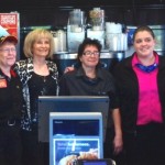 Sandy paused for a picture with the crew of the McDonald’s on U.S. 41 in Ruskin during her Coffee event.
