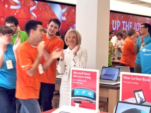 Sandy applauds Microsoft employees during the opening of its new store at International Mall.