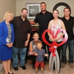 Commissioner Sandy Murman helps Kelly Flannery and the South Tampa Chamber cut the ribbon at Vincent Jackson's CTV Capital.