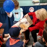 Sandy took time to read to some young students during the Pi Beta Phi Book Distribution for Title 1 Schools event, which was part of its Day of Service campaign.