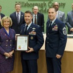 Commissioner Sandy Murman honors MacDill Air Force Base for its 75th Anniversary at a BOCC meeting. On hand for the presentation were Col. Dan Tulley, who commands the 6th Air Mobility Wing at MacDill and Command Chief Matthew Lussen.